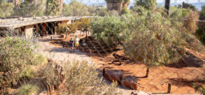 exterior view of australian adventures with two guest walking on a path inside